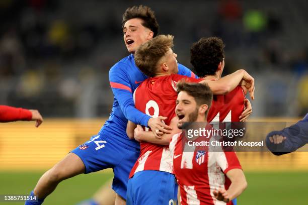 The team of Atletico Madrid celebrates after winning 1-0 dthe UEFA Youth League quarterfinal match between Borussia Dortmund and Atletico Madrid at...