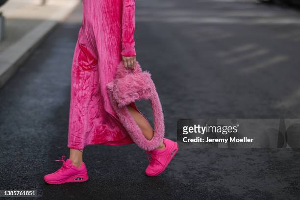 Palina Kozyrava is wearing Balenciaga pink fluffy hourglass bag, Skechers pink statement sneaker, Reserved crushed velvet pink, Fenty pink shades on...