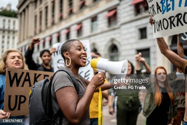 activists doing a demonstration outdoors - march of silence stockfoto's en -beelden