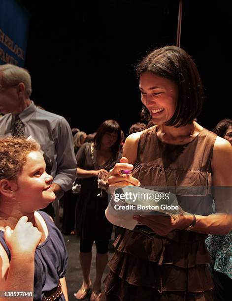 Actress Julia Jones, right, greeted Emily Snider of Newton, as Jones met fans at the Wheelock Family Theatre on May 27, 2010. Jones used to perform...