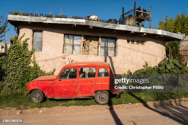 Vintage Renault 4 on February 7, 2022 parked outside its owners house in La Cumbre town, Cordoba, Argentina. .