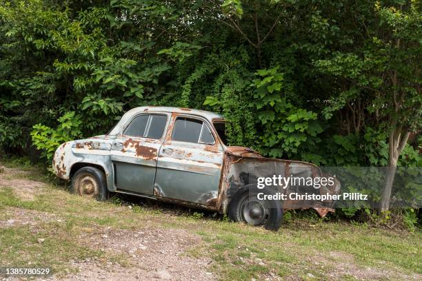 Vintage and abandoned Renault Dauphine Gordini on February 8, 2022 on the edge of La Cumbre town, Cordoba, Argentina.
