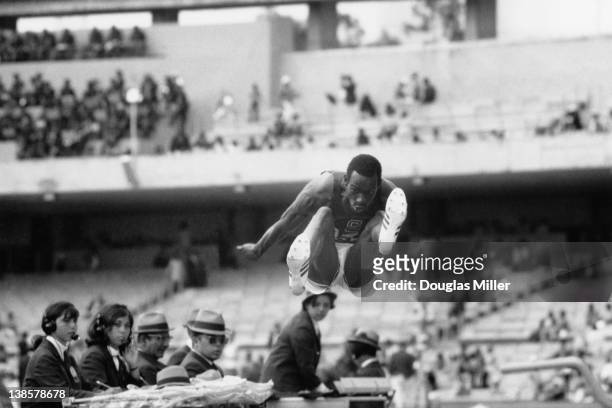 American athlete Bob Beamon breaks the Long Jump record at the 1968 Mexico Olympics, 20th October 1968. Keystone photographer Douglas Miller won...