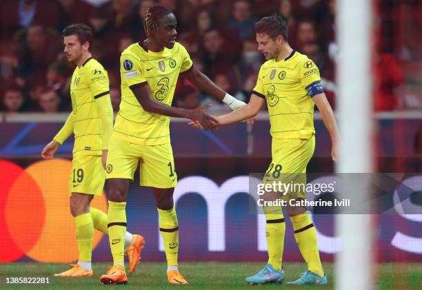 Cesar Azpilicueta of Chelsea celebrates their sides second goal with team mate Trevoh Chalobah during the UEFA Champions League Round Of Sixteen Leg...