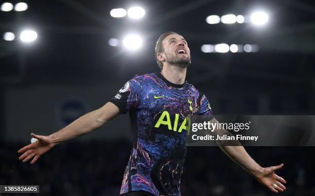 Harry Kane of Tottenham Hotspur celebrates after scoring their team's second goal during the Premier League match between Brighton & Hove Albion and...