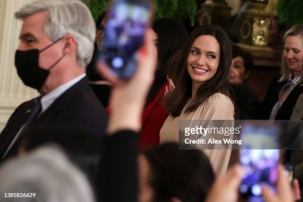 Actress Angelina Jolie attends an event marking the reauthorization of the Violence Against Women Act at the East Room of the White House on March...