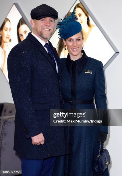 Mike Tindall and Zara Tindall attend day 2 'Ladies Day' of the Cheltenham Festival at Cheltenham Racecourse on March 16, 2022 in Cheltenham, England.