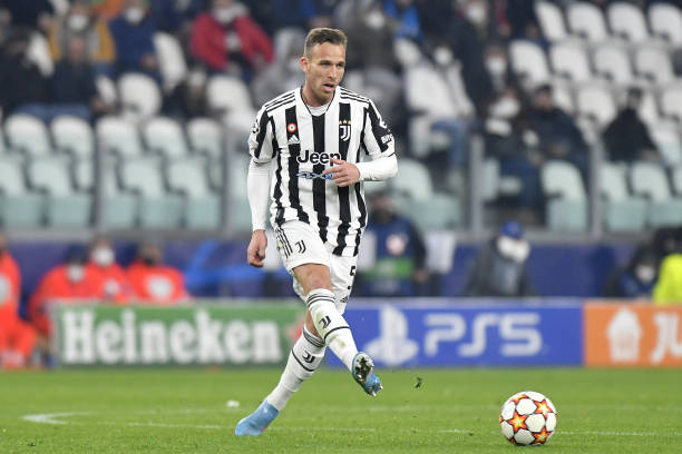 Arthur Melo of Juventus kicks the ball during the UEFA Champions League Round Of Sixteen Leg Two match between Juventus and Villarreal CF at Juventus...