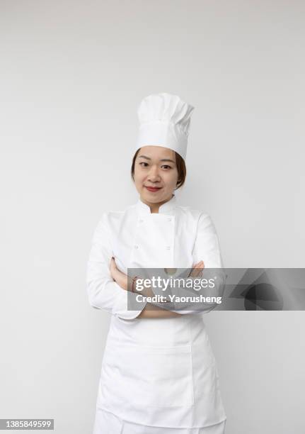 one asian female chef - uniforme de chef fotografías e imágenes de stock