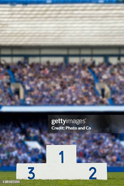 medal podium in the stadium - winners podium people stock pictures, royalty-free photos & images