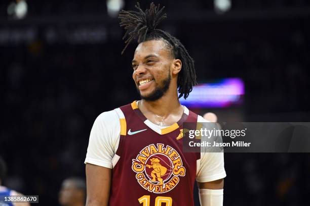 Darius Garland of the Cleveland Cavaliers jokes during the fourth quarter against the Philadelphia 76ers at Rocket Mortgage Fieldhouse on March 16,...