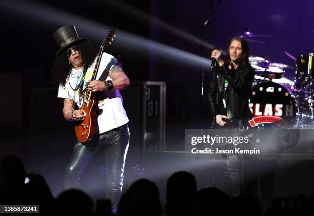 Musicians Slash and Myles Kennedy perform at The Grand Ole Opry on March 16, 2022 in Nashville, Tennessee.