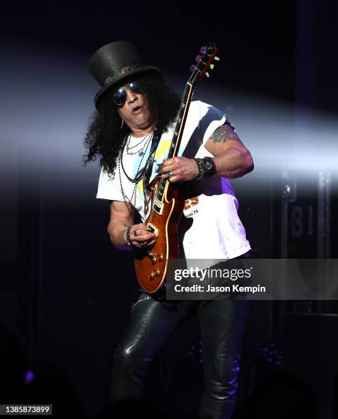 Musician Slash performs at The Grand Ole Opry on March 16, 2022 in Nashville, Tennessee.