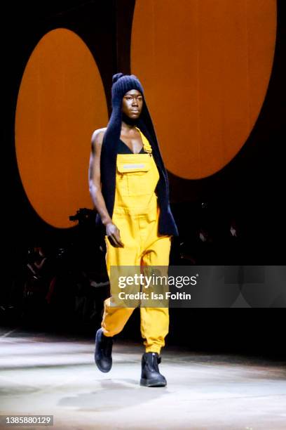 Model Aminata Sanogo walks the runway at the Eli by Elias Rumelis show at the Mercedes-Benz Fashion Week Berlin March 2022 at Kraftwerk Mitte on...