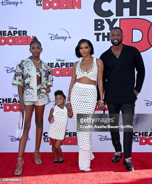 Zaya Wade, Kaavia James Union Wade, Gabrielle Union, and Dwyane Wade attend the Premiere of Disney's "Cheaper By The Dozen" on March 16, 2022 in Los...