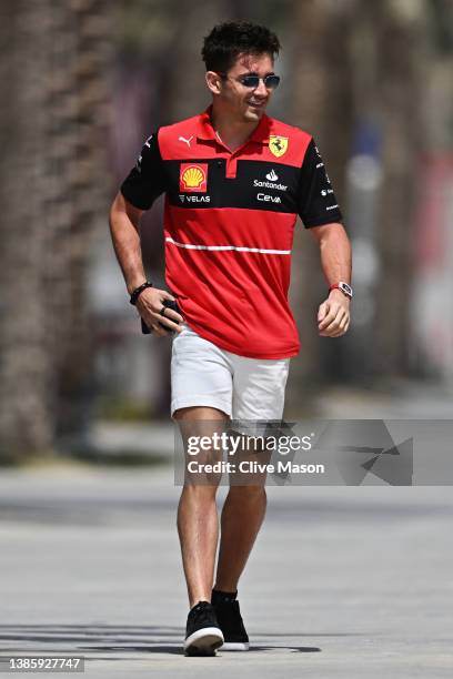 Charles Leclerc of Monaco and Ferrari walks in the Paddock during previews ahead of the F1 Grand Prix of Bahrain at Bahrain International Circuit on...