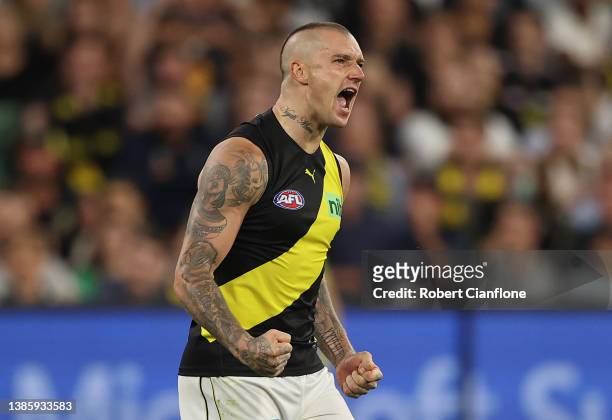 Dustin Martin of the Tigers celebrates after scoring a goal during the round one AFL match between the Richmond Tigers and the Carlton Blues at...