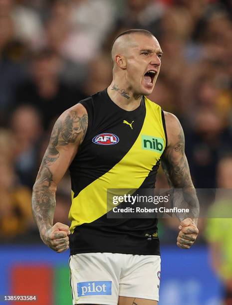 Dustin Martin of the Tigers celebrates after scoring a goal during the round one AFL match between the Richmond Tigers and the Carlton Blues at...