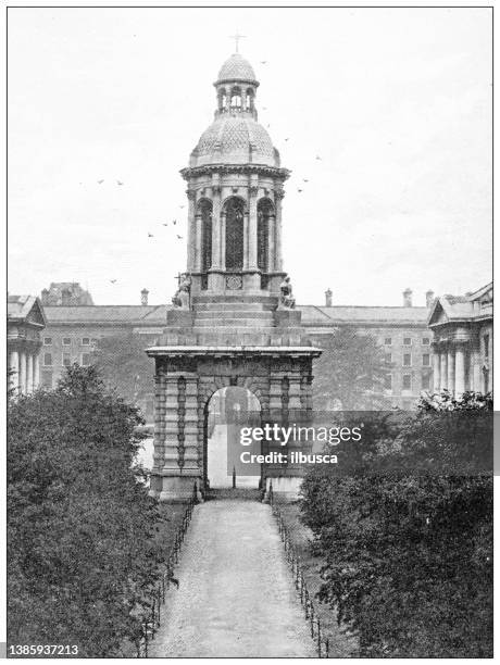 antique travel photographs of ireland: campanile (trinity college dublin) - trinity college stock illustrations