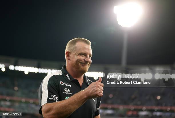 Blues coach, Michael Voss celebrates after the Blues defeated the Tigers during the round one AFL match between the Richmond Tigers and the Carlton...