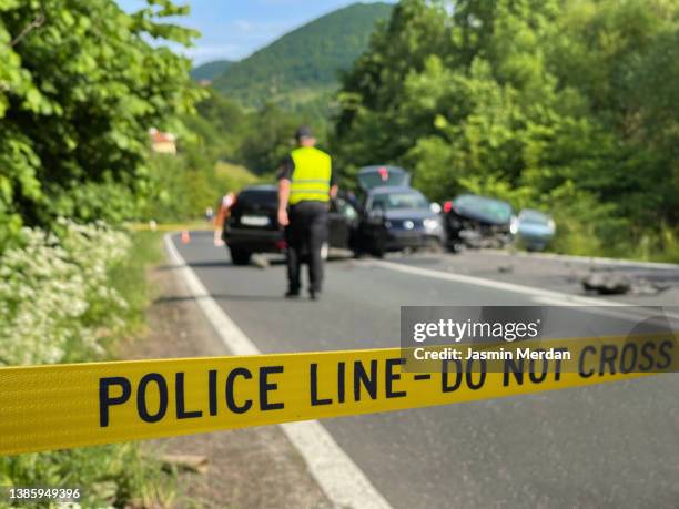 police yellow line on traffic accident - road accident imagens e fotografias de stock