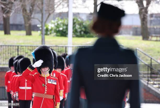 Catherine, Duchess of Cambridge takes the salute as she attends the 1st Battalion Irish Guards' St. Patrick's Day Parade with Prince William, Duke of...