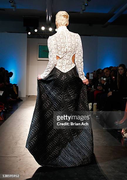 Model walks the runway at the Megla M runway show during Nolcha Fashion Week New York at the Alvin Ailey Studios on February 9, 2012 in New York City.