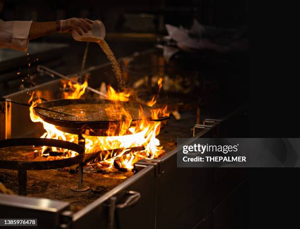 Paella Rice Adding 2,732 Rice Fire Stock Photos, High-Res Pictures, and Images - Getty Images