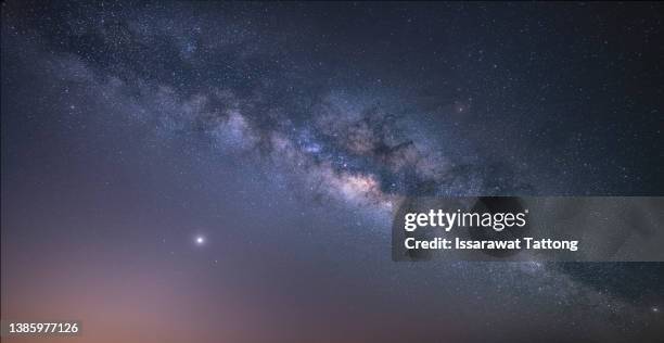 view universe space shot of milky way galaxy with stars on a night sky background.the milky way is the galaxy that contains our solar system. - divination stock-fotos und bilder