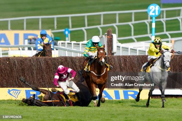 Davy Russell and Conflated part ways at the second last in The Ryanair Chase race during day three of The Cheltenham Festival 2022 at Cheltenham...