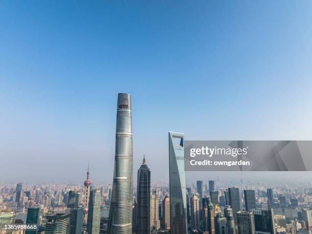 aerial view of downtown shanghai - shanghai world financial center stock-fotos und bilder