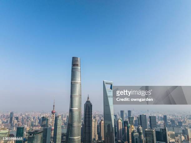 aerial view of downtown shanghai - world financial centre stock pictures, royalty-free photos & images
