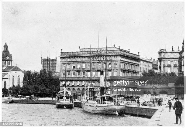 antique travel photographs of sweden: quay of the grand hotel - stockholm port stock illustrations