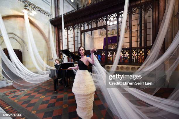 Musicians performs at the Sudi Etuz Presentation during the Fashion Week Istanbul at The Crimea Memorial Church Istanbul on March 17, 2022 in...