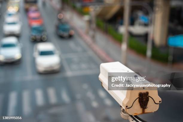 cctv,cctv camera new technology for checking speed of cars on high way street - remote guarding stock pictures, royalty-free photos & images