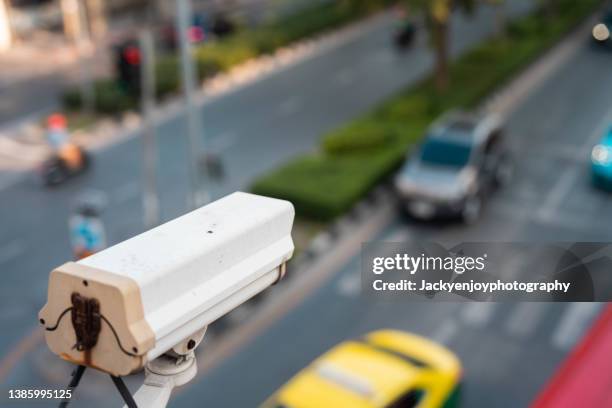 cctv camera new technology for checking speed of cars on high way street and check for safe accidence on street - security camera view stock pictures, royalty-free photos & images