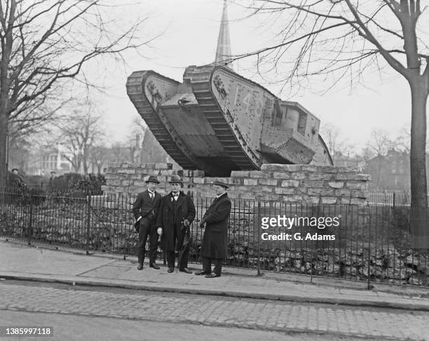 British Mark IV tank on display at the north west corner of Turnham Green in Chiswick, west London, 12th March 1920. The tank was presented to...