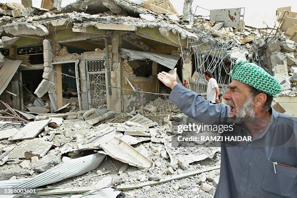 House Rumble Iraq An Iraqi man reacts in front of destroyed houses in the city of... News ...