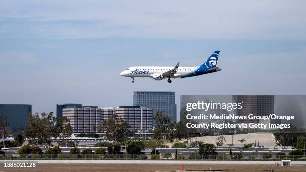 Santa Ana, CA An Alaska Airlines jet lands at John Wayne Airport in Santa Ana, CA on Tuesday, March 15, 2022.