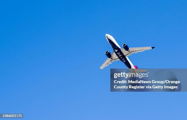 Santa Ana, CA A Delta Airlines jet takes off from John Wayne Airport in Santa Ana, CA on Tuesday, March 15, 2022.