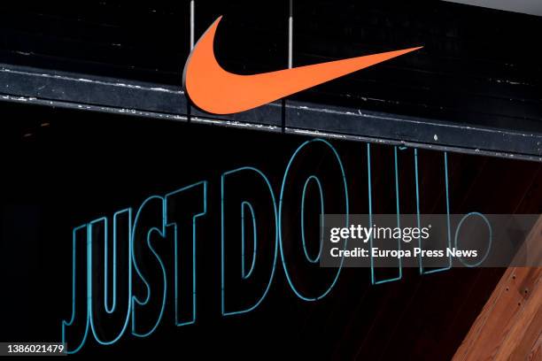 Nike store sign on March 5 in Madrid, Spain. Several companies have closed their branches and stores in Russia after it invaded Ukraine. Inditex...