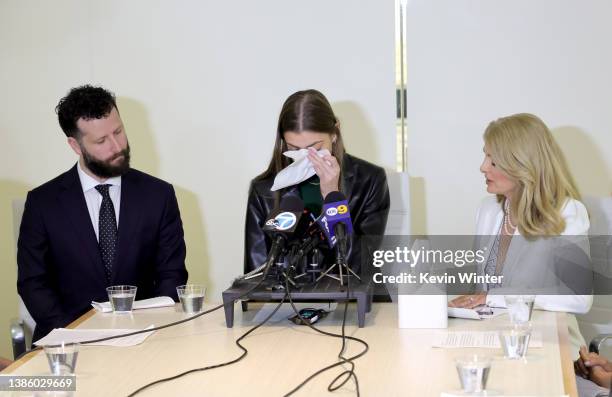 Jane Doe 2, Gwen, with attorneys Alick Fudali and Lisa Bloom , speaks at a press conference with four women accusing Guess Inc. Co-Founder Paul...