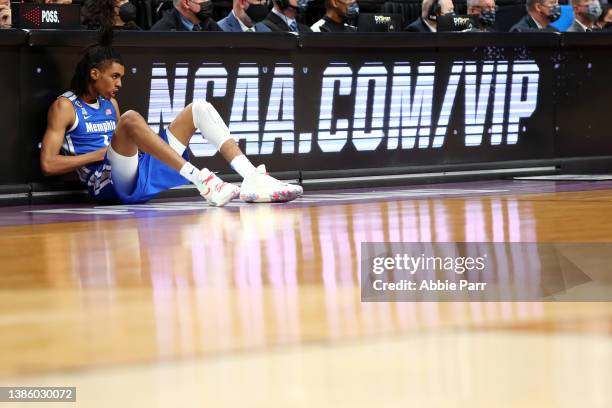 Emoni Bates of the Memphis Tigers waits to enter the game during the first half against the Boise State Broncos in the first round game of the 2022...