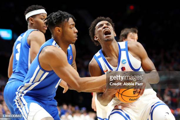 Earl Timberlake of the Memphis Tigers strips the ball from Abu Kigab of the Boise State Broncos during the first half in the first round game of the...