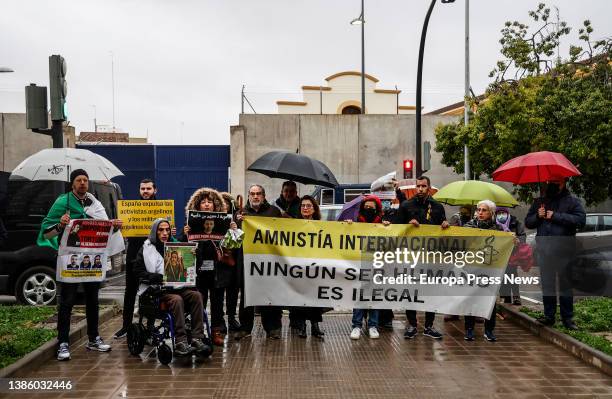 Several people take part in a rally called by Amnesty International to prevent the deportation to Algeria of activist Mohamed Benhlima, at the...