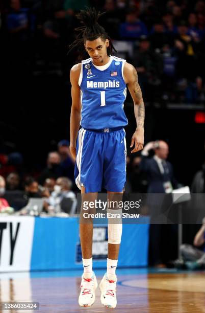 Emoni Bates of the Memphis Tigers reacts after making a basket during the first half against the Boise State Broncos in the first round game of the...