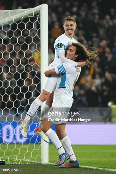 Valentin Rongier celebrates with Matteo Guendouzi of Marseille after scoring their team's second goal during the UEFA Conference League Round of 16...