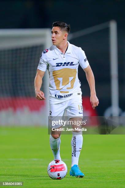 Efrain Velarde of Pumas drives the ball during the quarterfinals second leg match between Pumas UNAM and New England as part of the Concacaf...