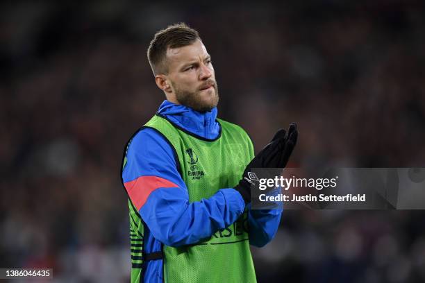 Andriy Yarmolenko of West Ham United applauds fans whilst warming up during the UEFA Europa League Round of 16 Leg Two match between West Ham United...