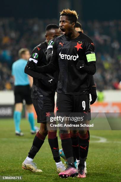 Peter Olayinka of SK Slavia Praha celebrates after scoring their team's first goal during the UEFA Conference League Round of 16 Leg Two match...